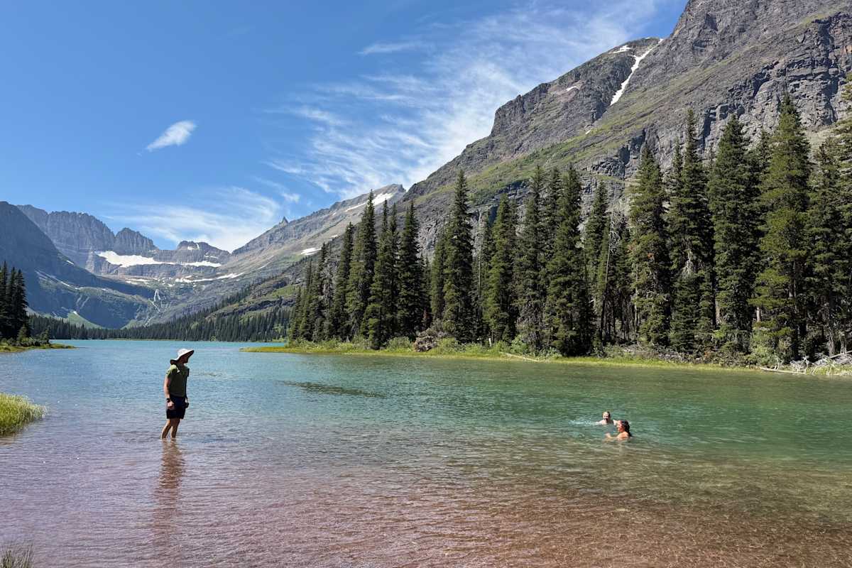 Guests swimming in Glacier National Park